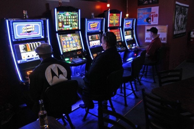 Casino expansion images of people playing slot machines