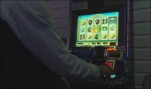 person playing a lotto slot game